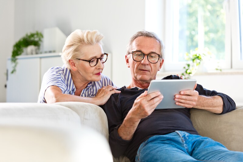 Couple looking at tablet