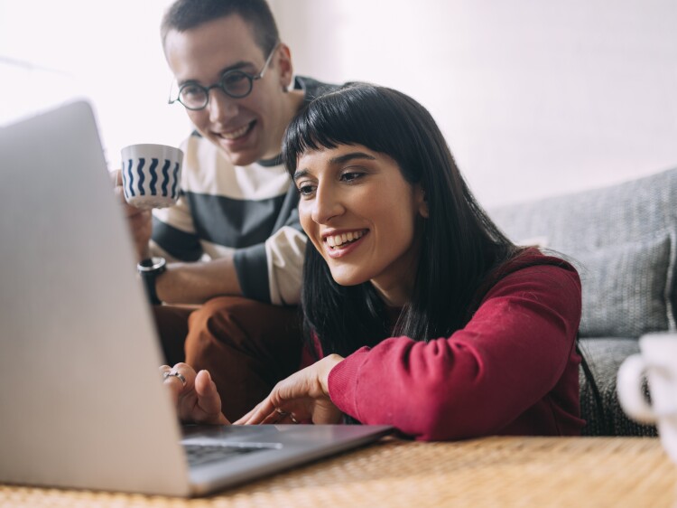 Couple looking at computer