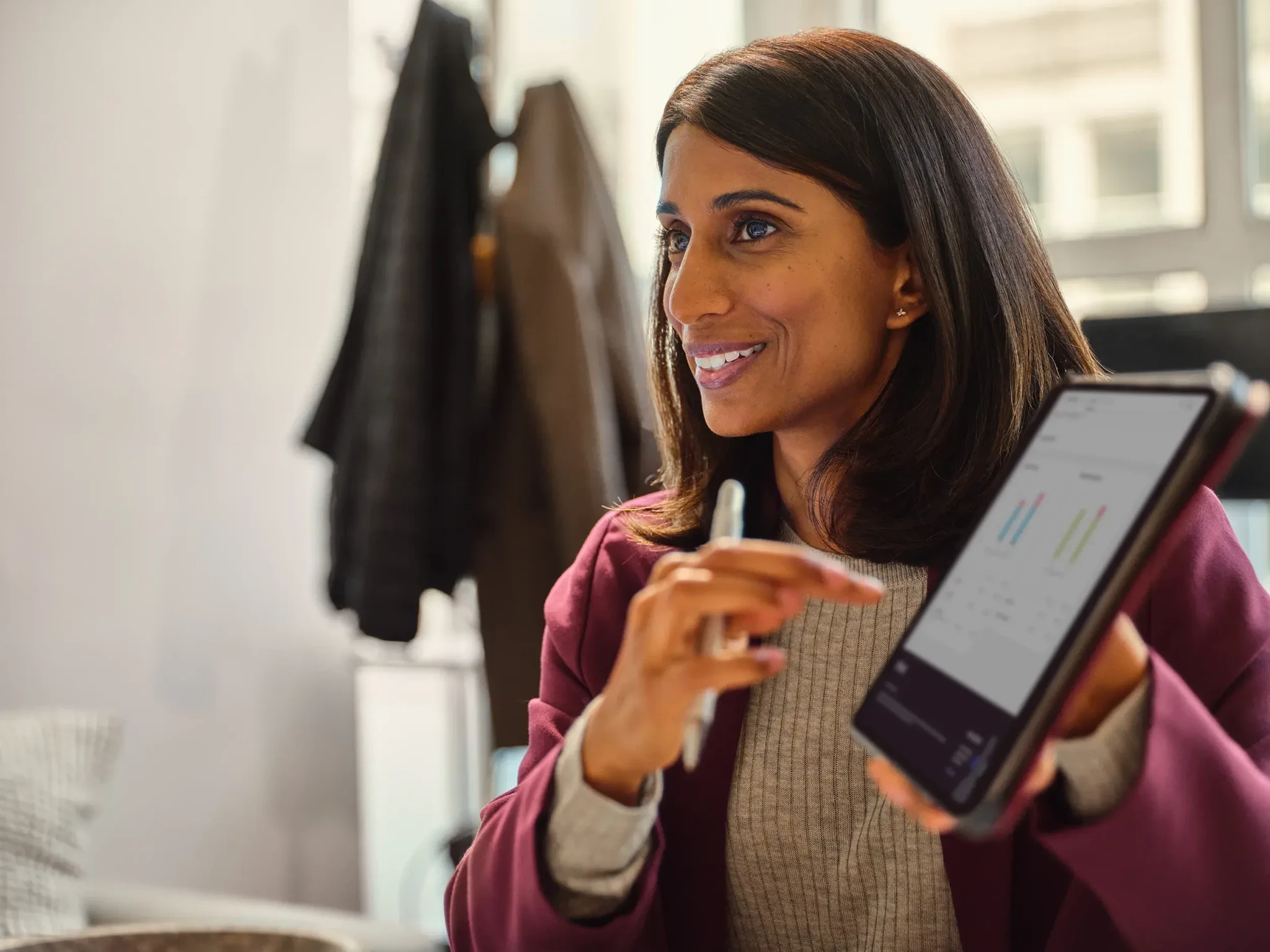 Woman holding a tablet
