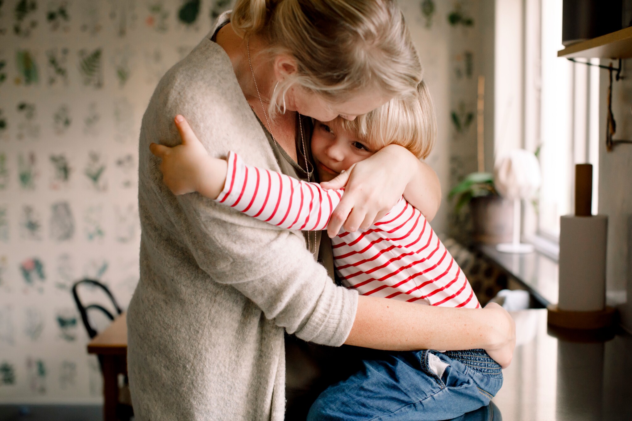 Woman holding her child