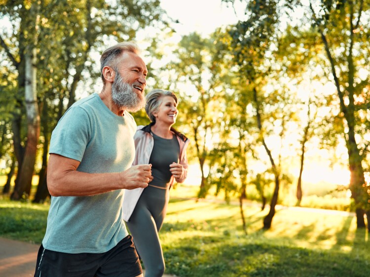 Couple in 50s jogging