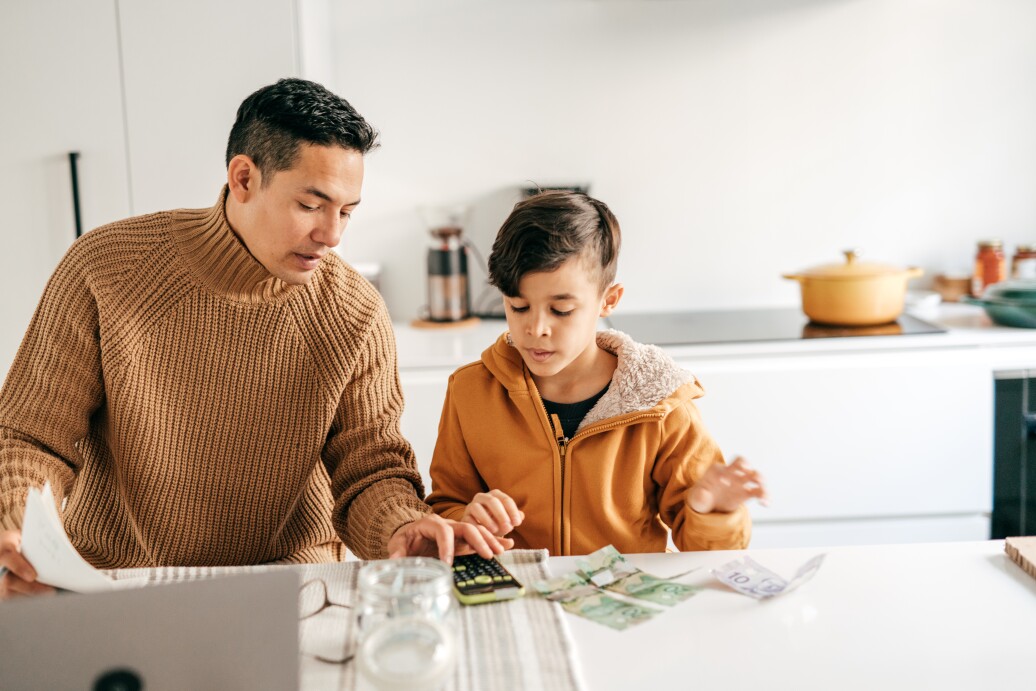 Father calculating with son