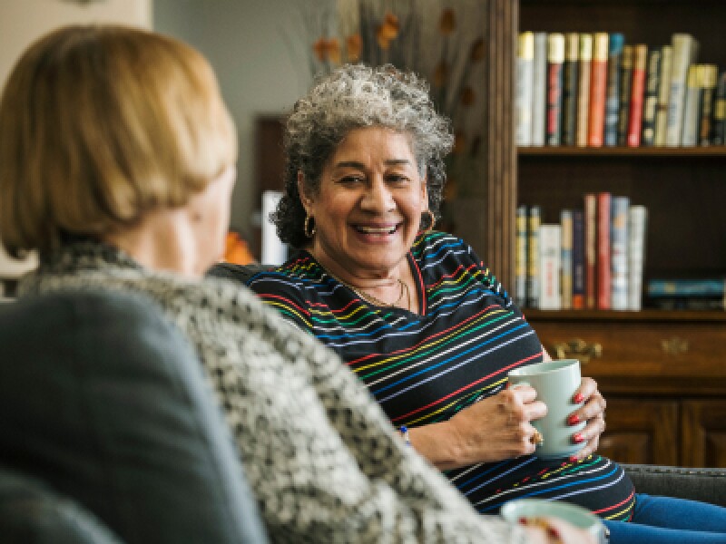 Senior women drinking tea and talking