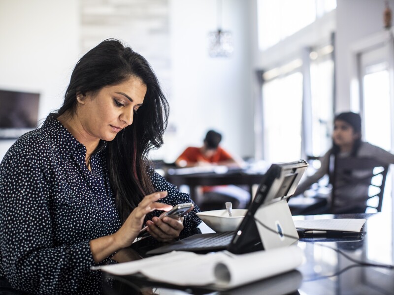 Woman researching in cafe