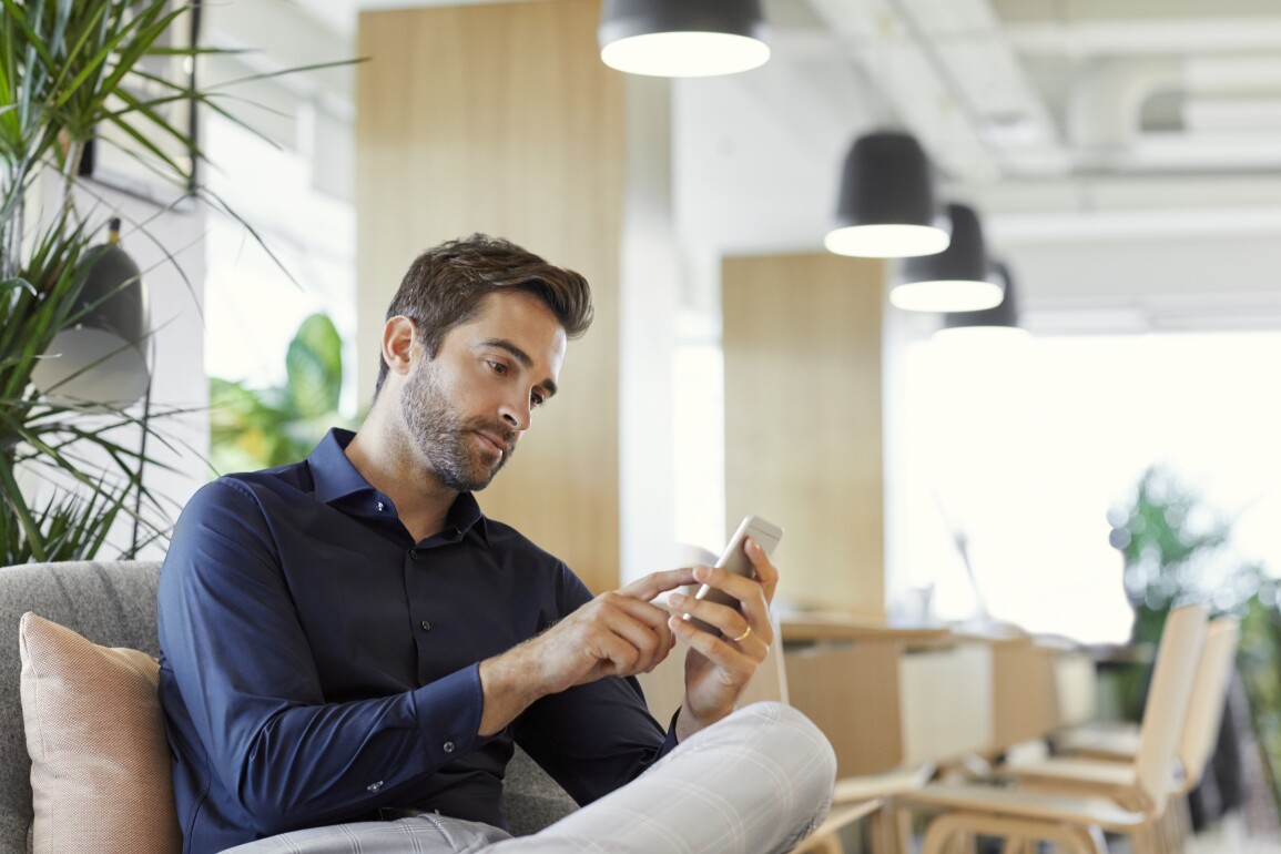 Male using mobile phone