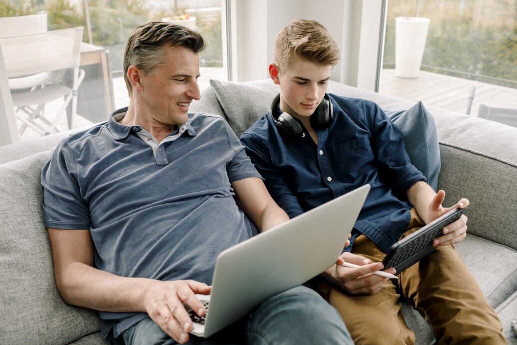 Father and son on electronics