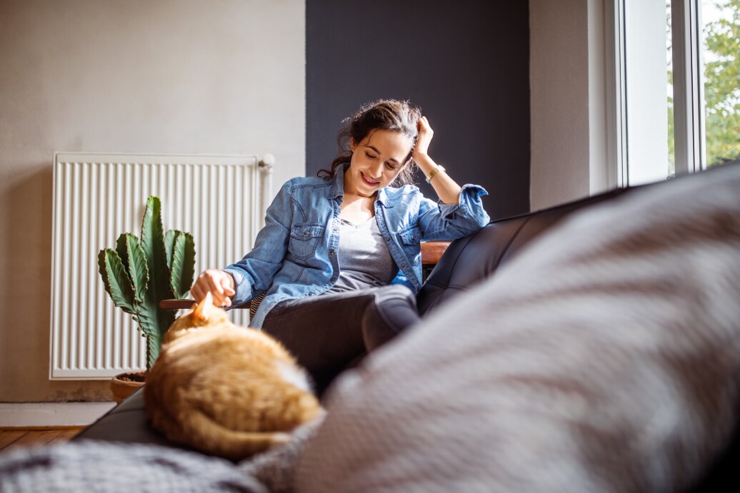 Woman sitting on couch