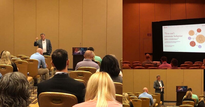 Jeff Haines speaking to an audience works on the screen read You can't automate behavior into existence
