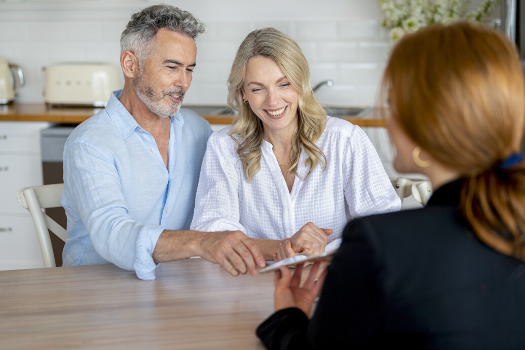 Couple in 50s in meeting