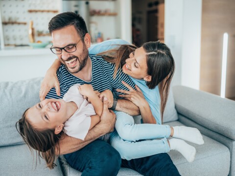 Young family playing