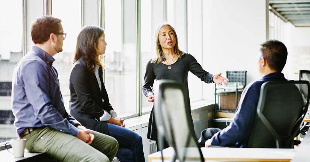 Group gathered in an office for a meeting