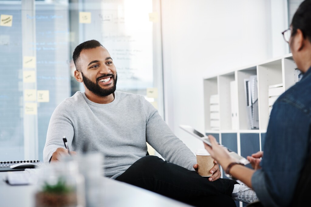 Man smiling in casual office