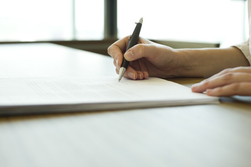 Person signing a document