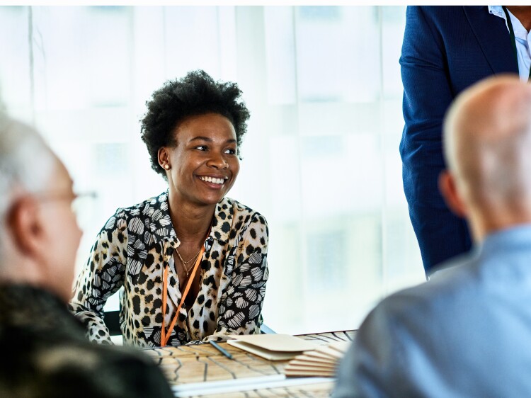 Woman smiling in meeting