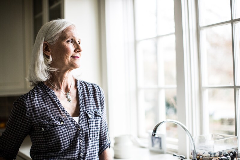 portrait of senior woman in kitchen