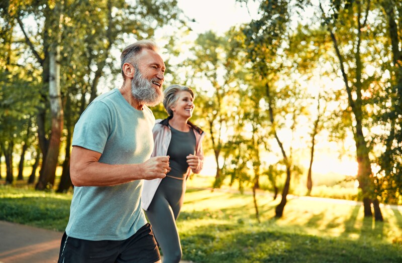 Couple in 50s jogging