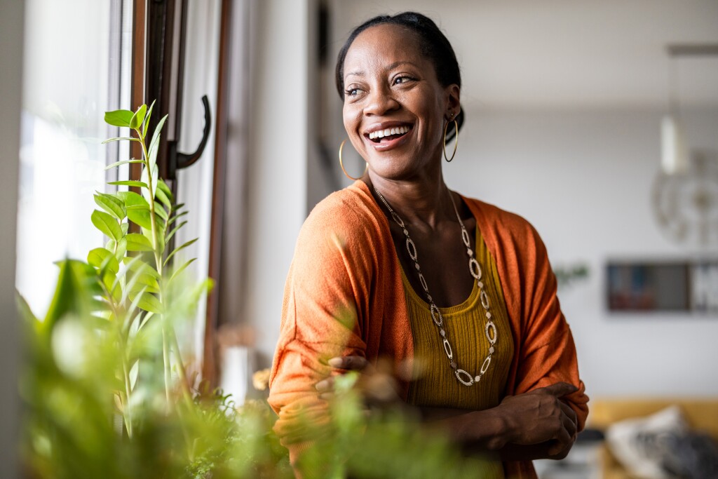 Woman smiling looking out the window