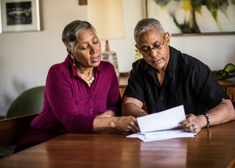 Couple looking at papers