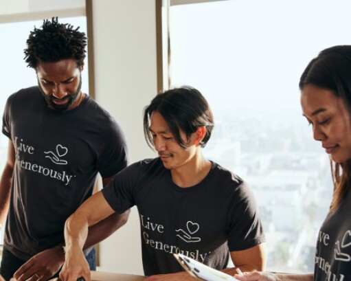 Group of action team adults packing care packages