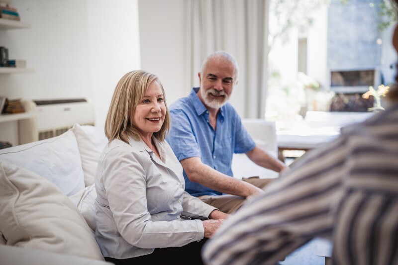 Financial advisor in a meeting with a senior couple