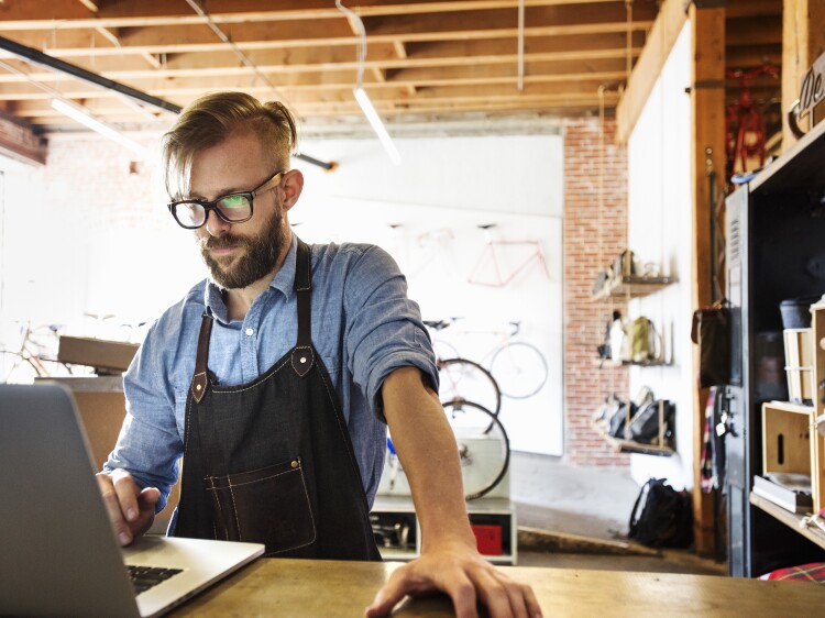 Business owner on laptop