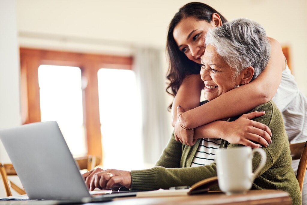 Woman hugging her grandmother