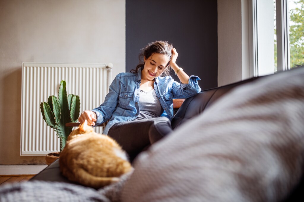 Woman sitting on couch