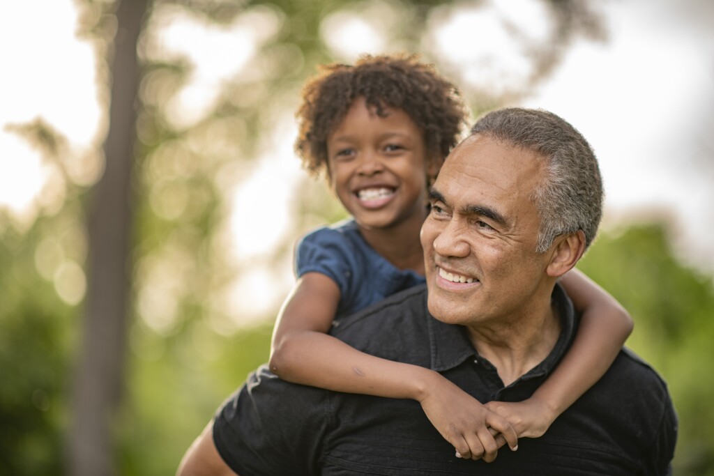 Granddaughter and Grandfather Outdoor Portrait