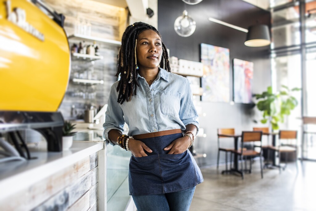 Portrait of female coffeeshop owner in coffeeshop
